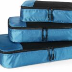 Lot de 4 organisateurs de vêtements Amazon Essentials en tissu gris avec fenêtre en maille et fermeture éclair — tailles S, M, L et slim