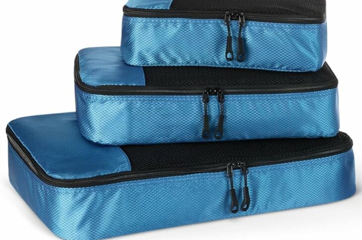 Lot de 4 organisateurs de vêtements Amazon Essentials en tissu gris avec fenêtre en maille et fermeture éclair — tailles S, M, L et slim